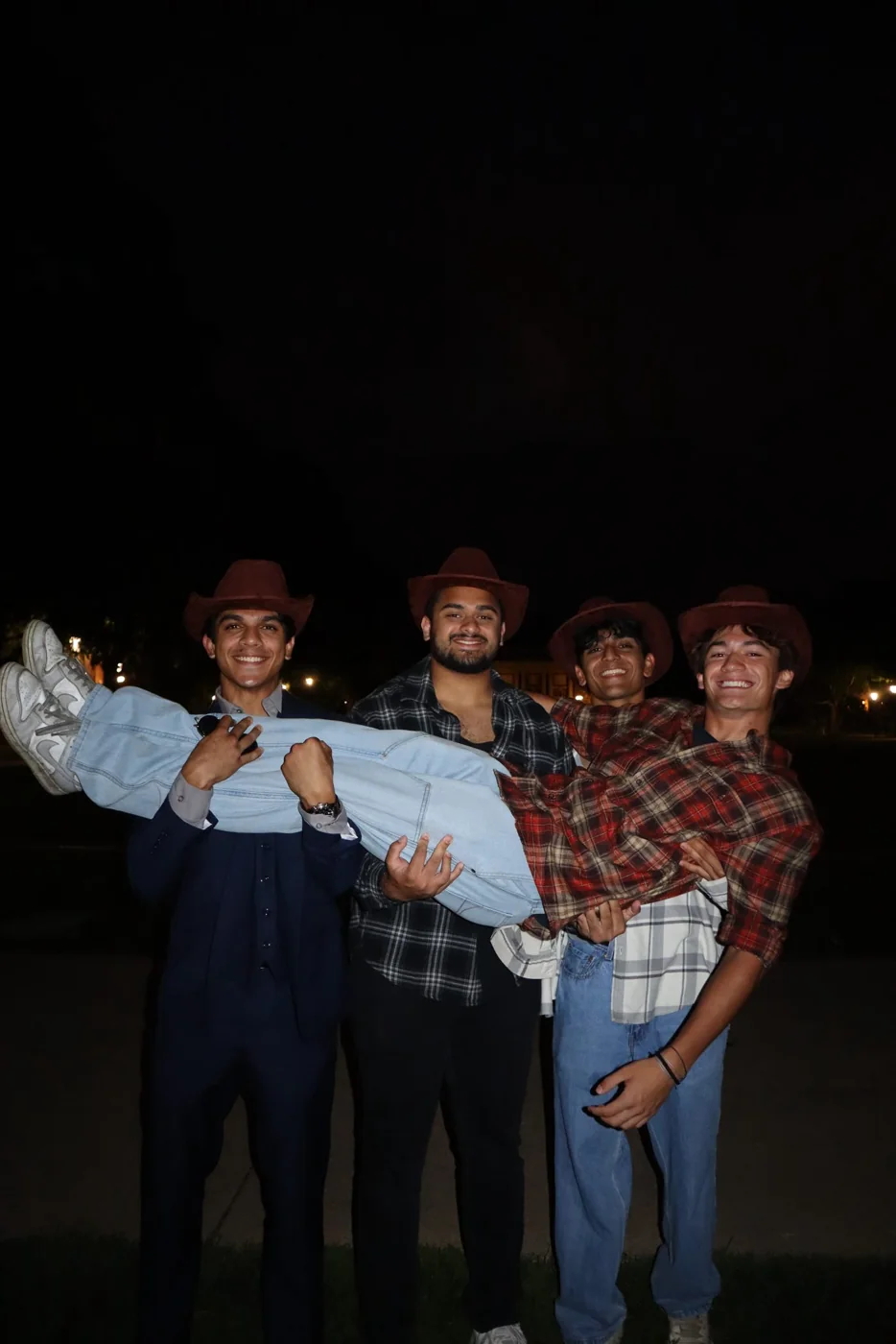 PCT family together outdoors at night
