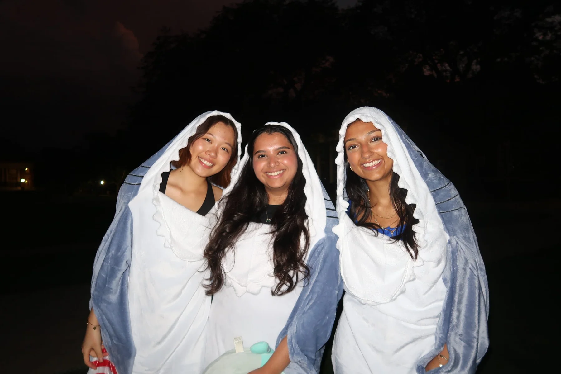 PCT family in matching white costumes