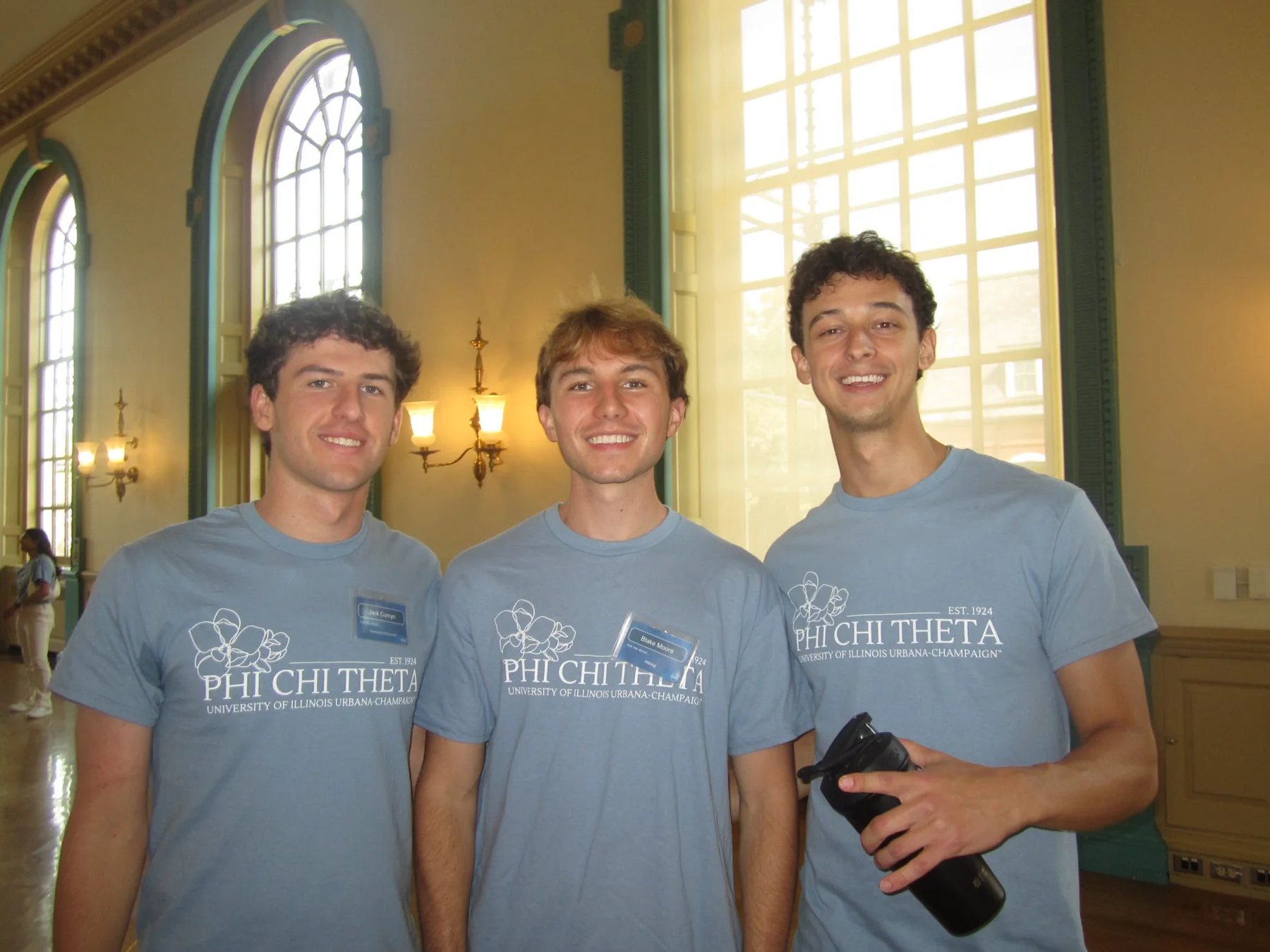 Three PCT members in matching blue chapter shirts